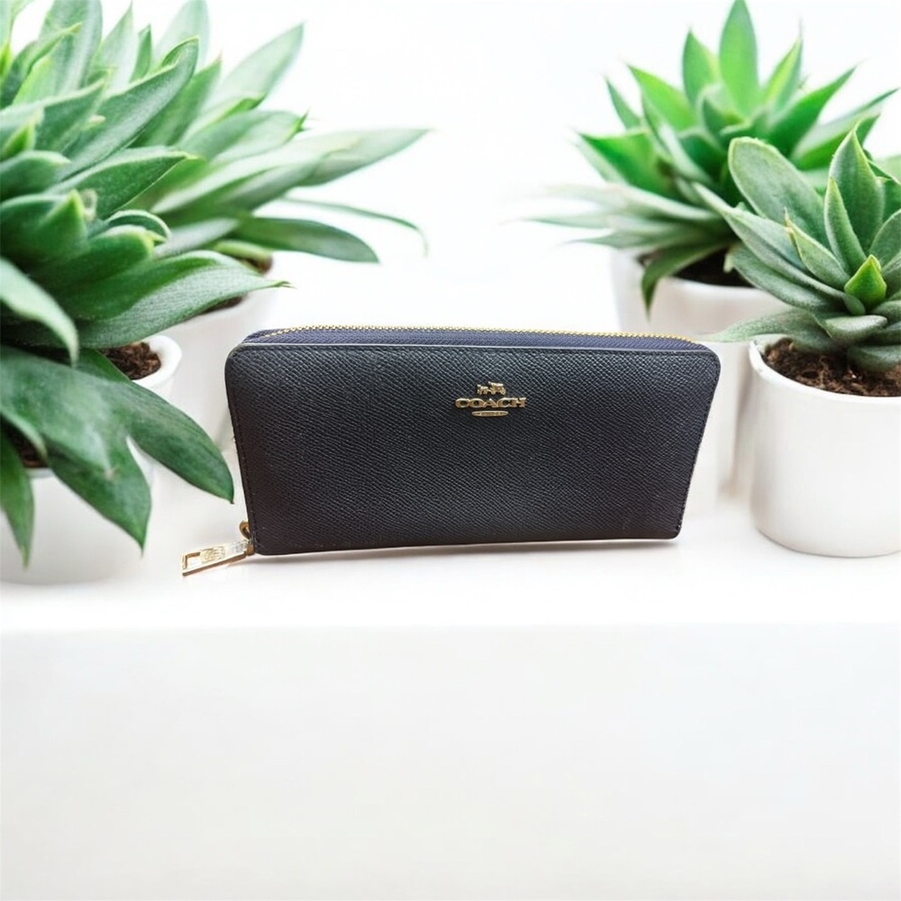 Coach Navy Zip Around Leather Wallet with Silver accents.